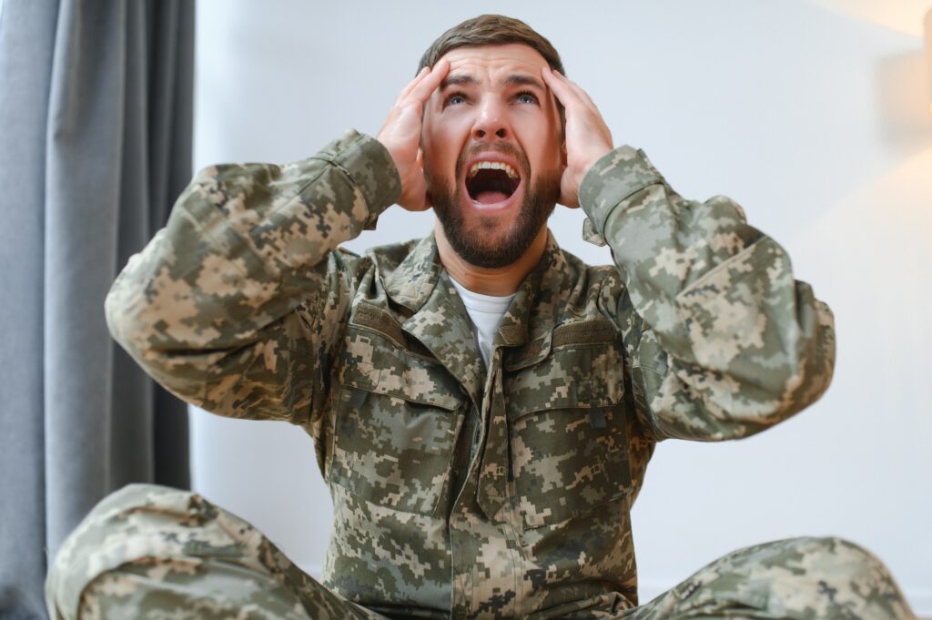 Military veteran with post traumatic stress disorder screaming at home